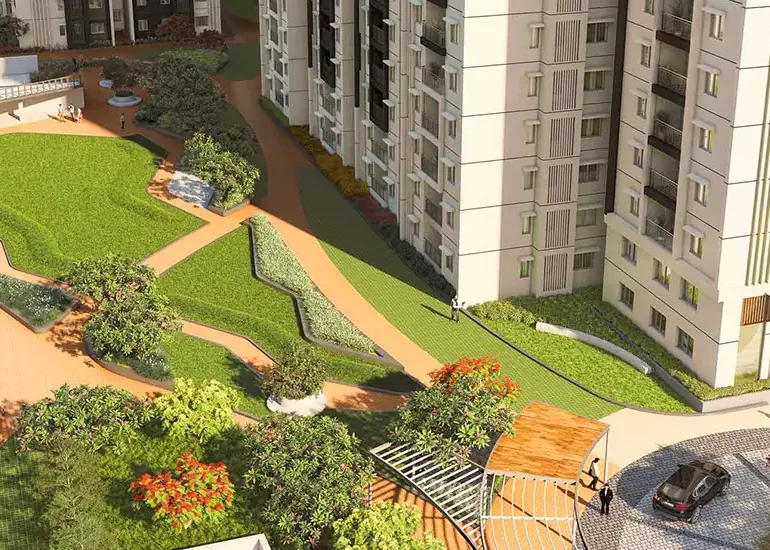 Brigade Citadel, Moti Nagar, artistic impression Apartment towers above landscaped lawns and winding walkways at Brigade Citadel